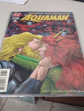 DC Aquaman Comic Book with Red and Yellow Cover Art In A Sleeve